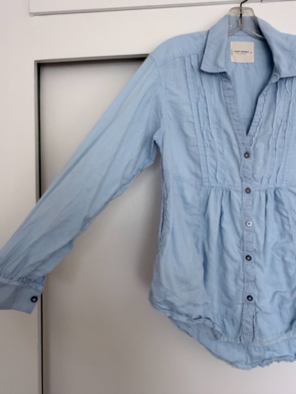 Feminine oversized pintuck button-down shirt in sky blue